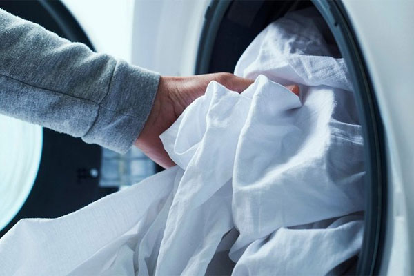 برای چروک نشدن لباس در لباسشویی چه باید کرد