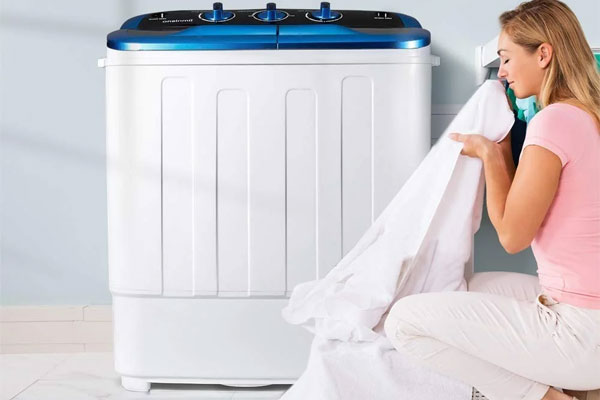 روش آبکشی لباس در لباسشویی دوقلو